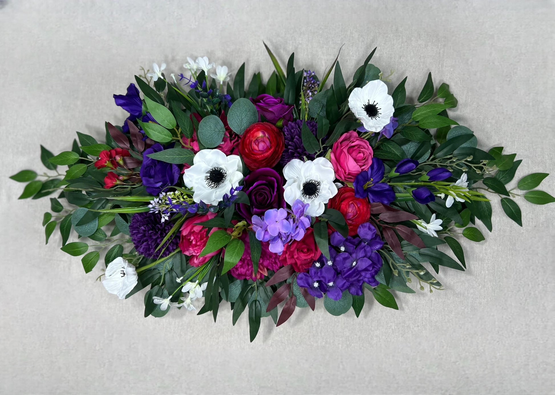 Jewel Tones Arch Arrangements Wedding Purple Magenta Burgundy Ranunculus Arbor Arrangement Wild Flowers Deep Purple Vibrant White Anemone