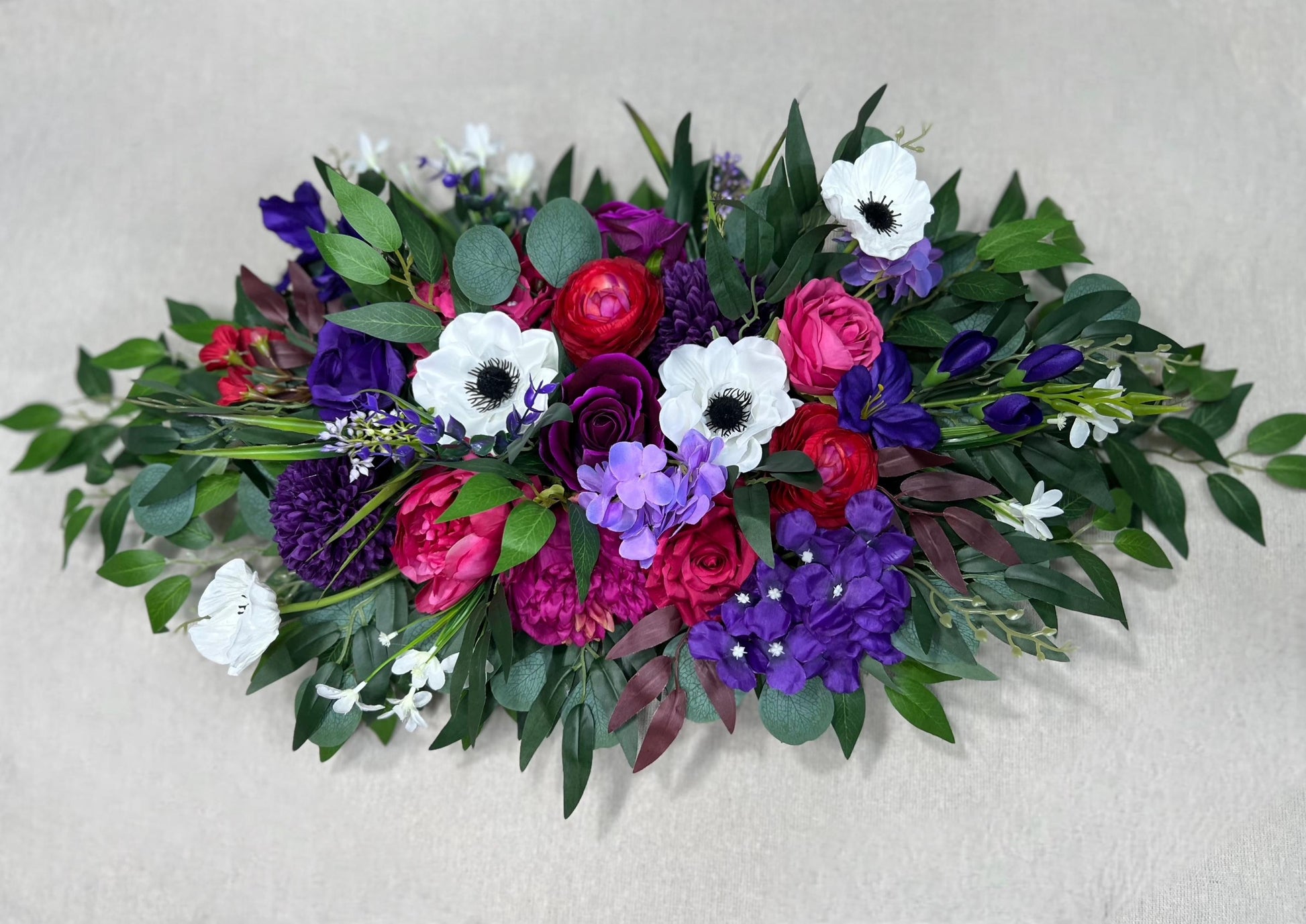 Jewel Tones Arch Arrangements Wedding Purple Magenta Burgundy Ranunculus Arbor Arrangement Wild Flowers Deep Purple Vibrant White Anemone